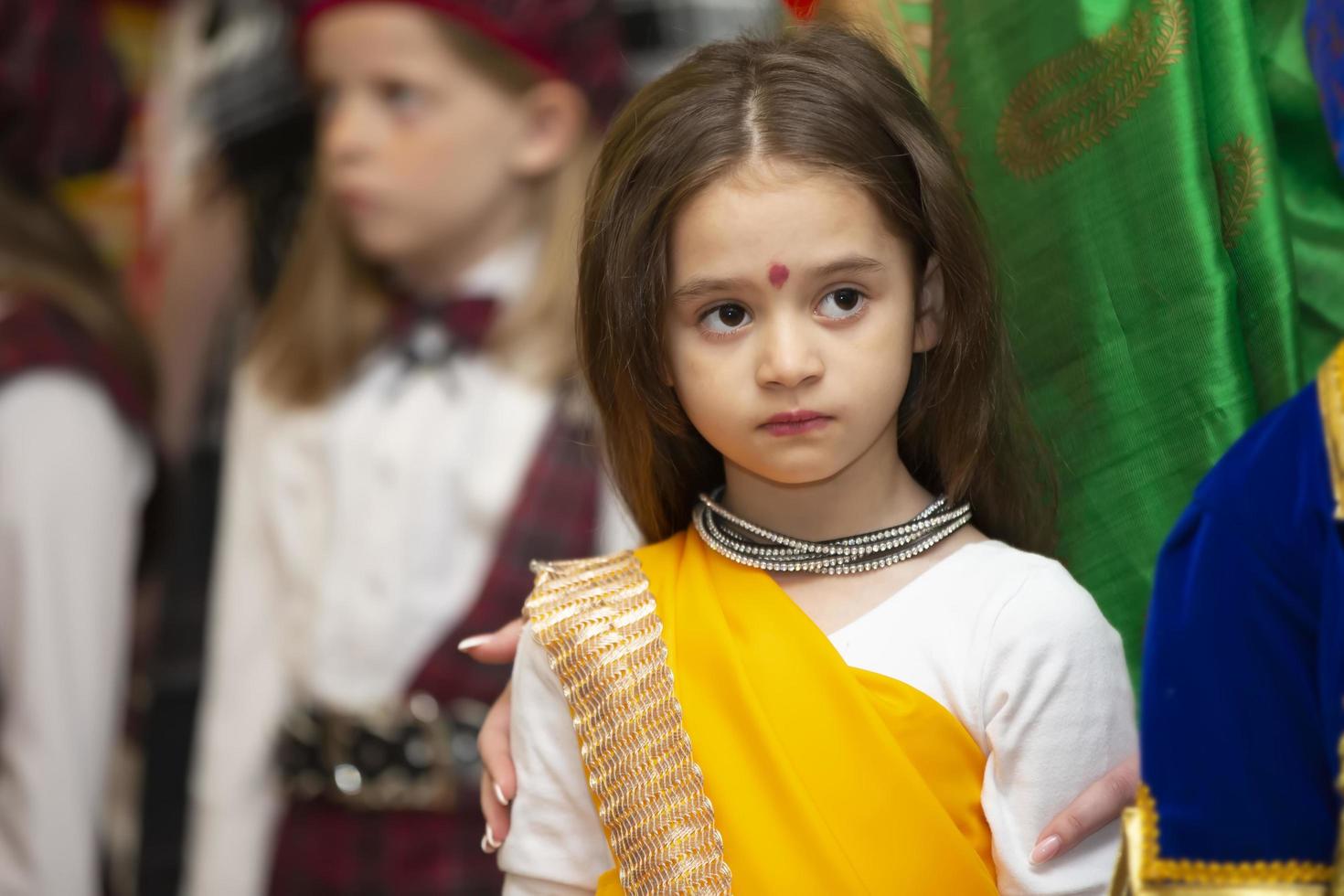 Belarus, city of Gomil, May 21, 2021. People's Friendship Day.Little Indian girl in national dress. photo