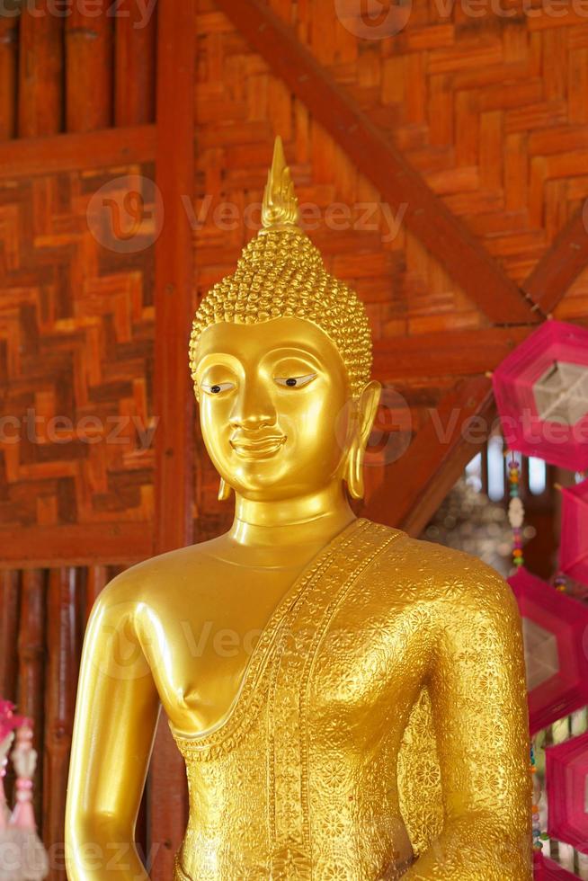 Makha Asanaha Visakha Bucha Day Golden Buddha image photo