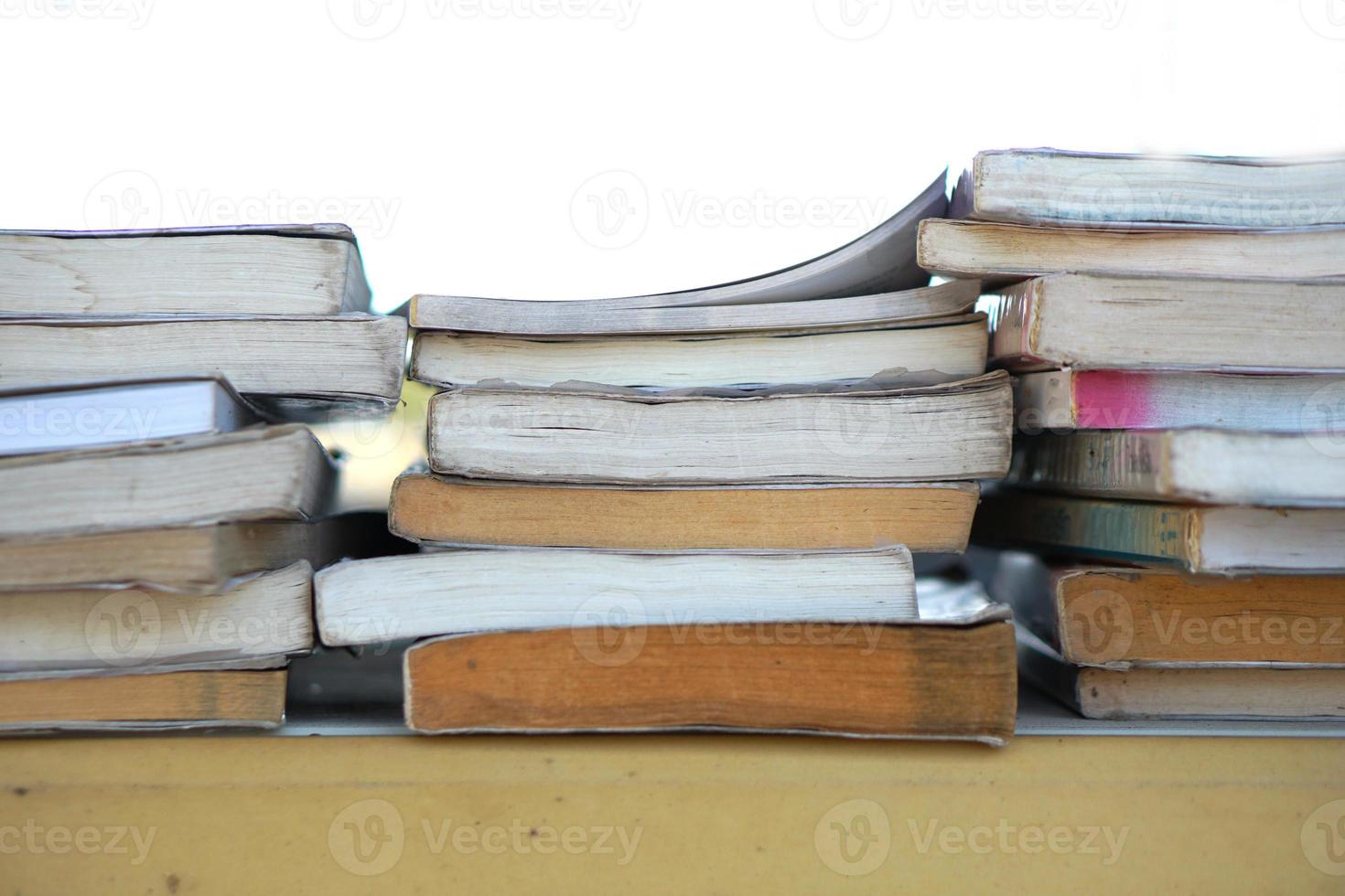 Stacks of old books waiting to be recycled. photo