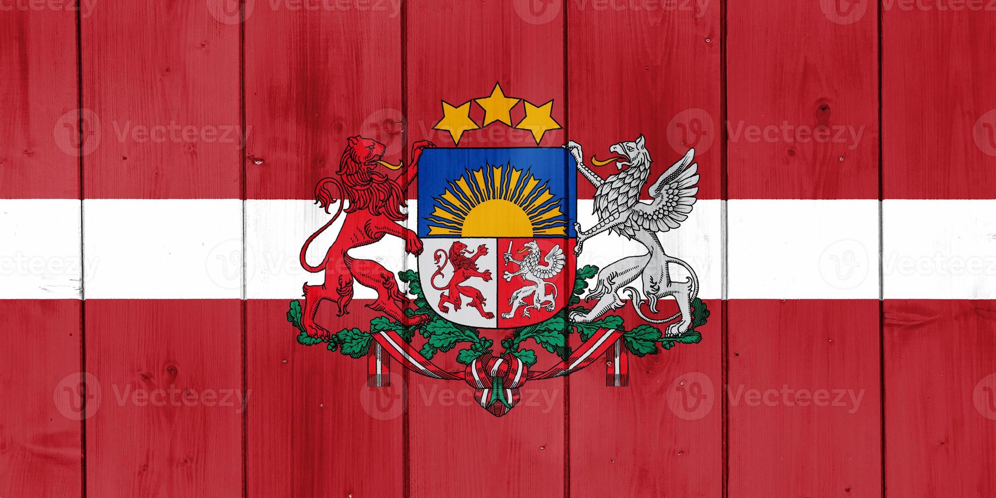 Flag of Latvia on a textured background. Concept collage. photo