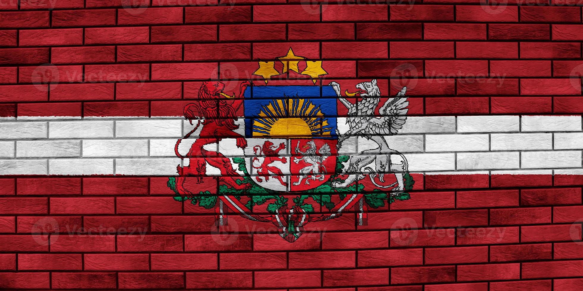 Flag of Latvia on a textured background. Concept collage. photo