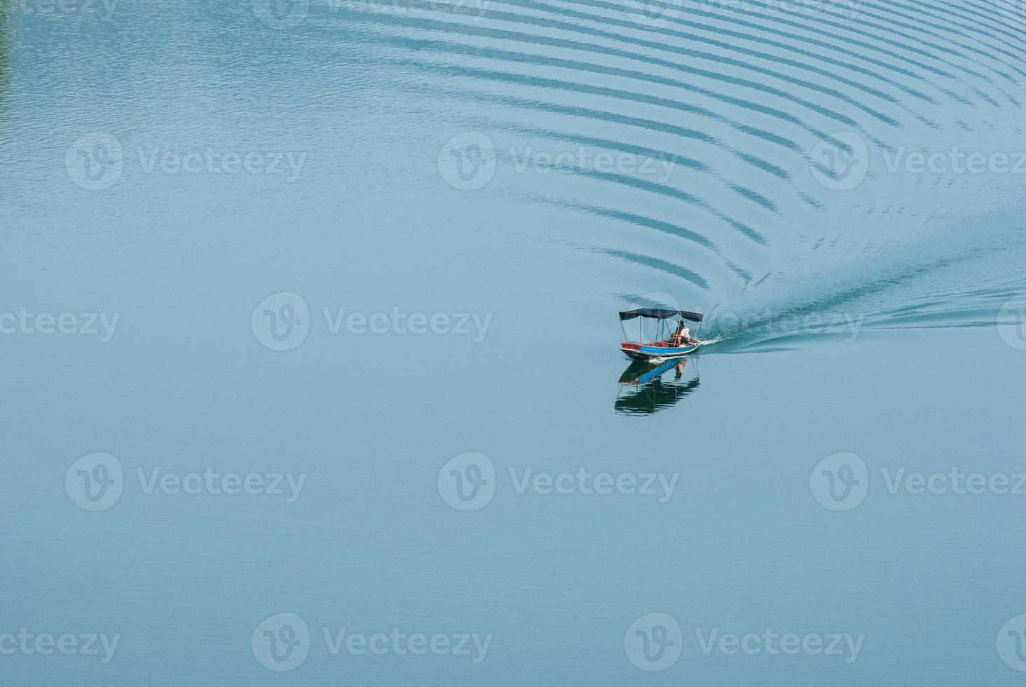 The boat sail at Khundanprakarnchol Dam, Nakornnayok, Thailand. photo