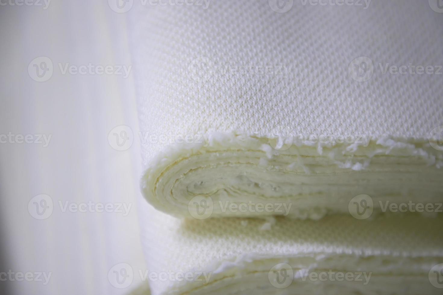 Close-up focus folded stacked sherpa fabric backdrop pattern textured  can be used as a background wallpaper photo