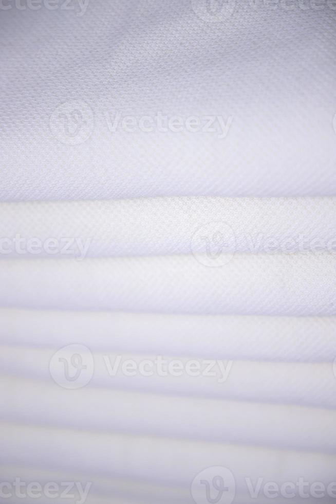 Close-up focus folded stacked sherpa fabric backdrop pattern textured  can be used as a background wallpaper photo
