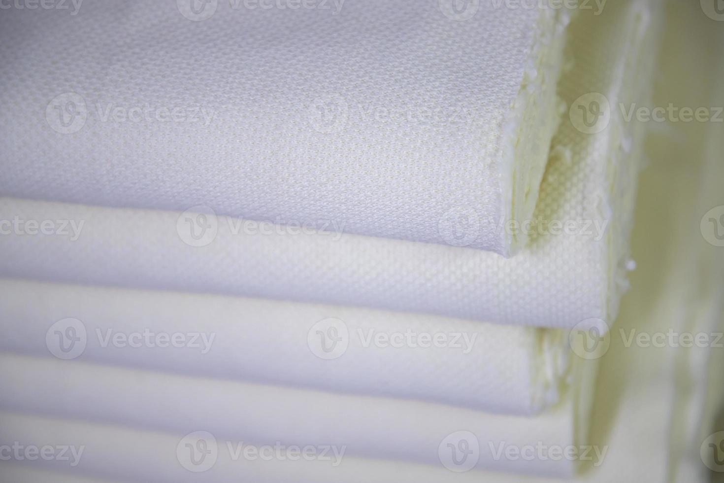 Close-up focus folded stacked sherpa fabric backdrop pattern textured  can be used as a background wallpaper photo