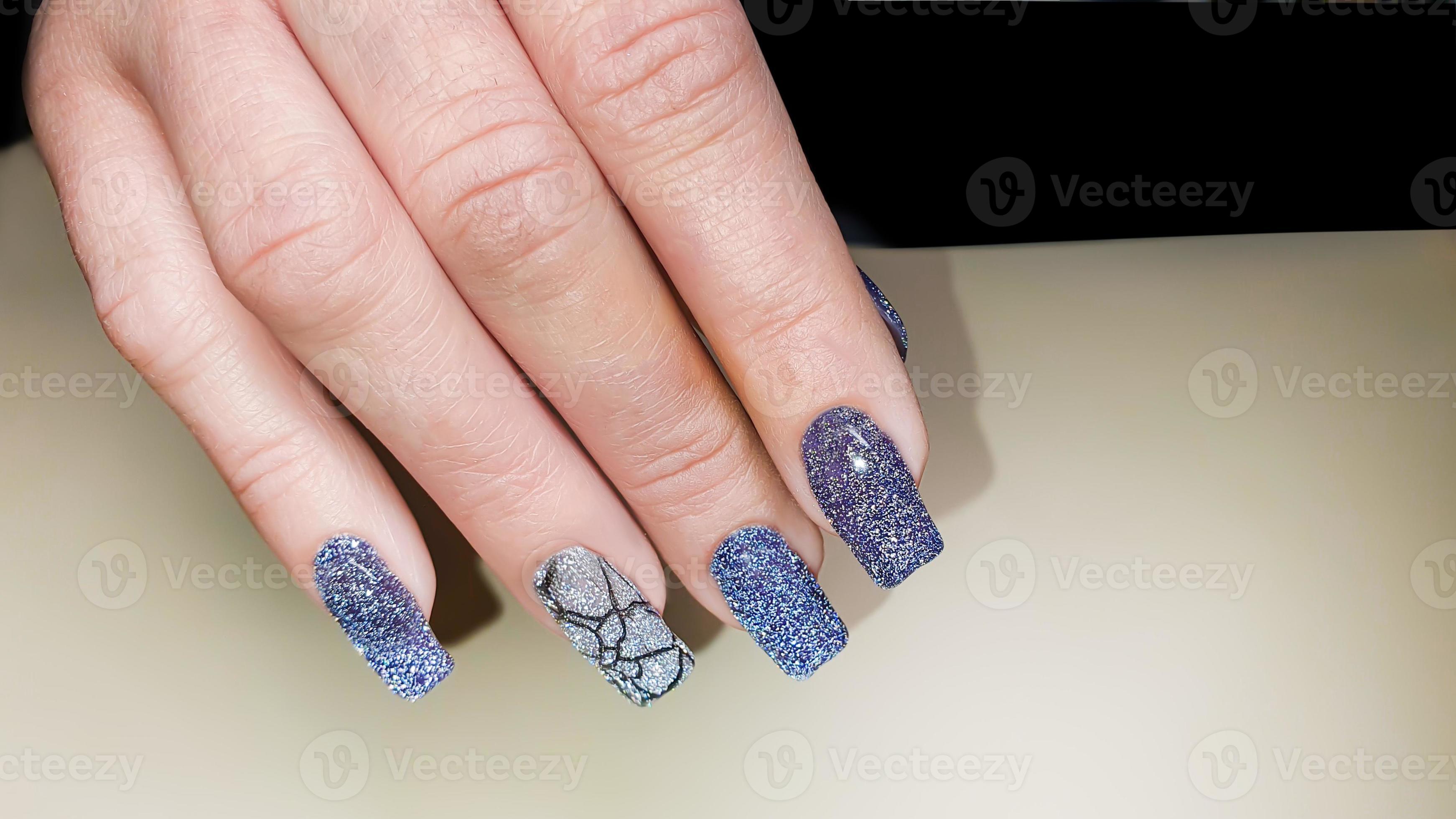 Acrylic nail extension, manicure, nail correction, hands in the