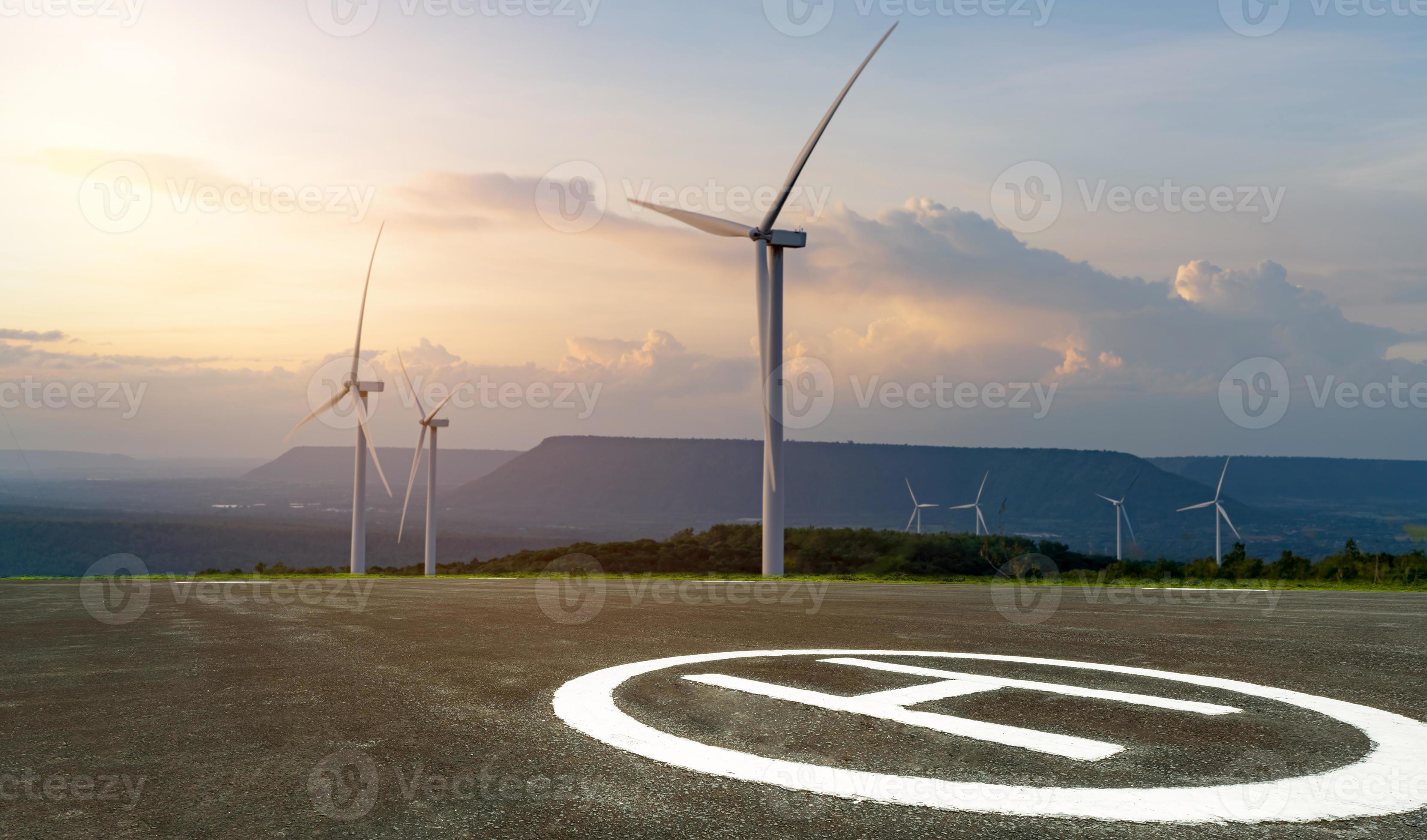 Asphalt helipad and wind farm. Wind energy. Wind power. Sustainable