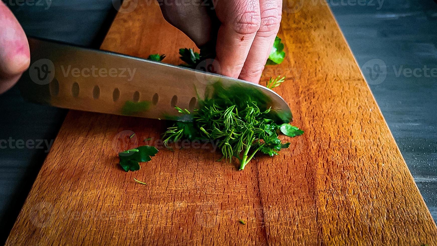 chopped parsley on a cutting board photo