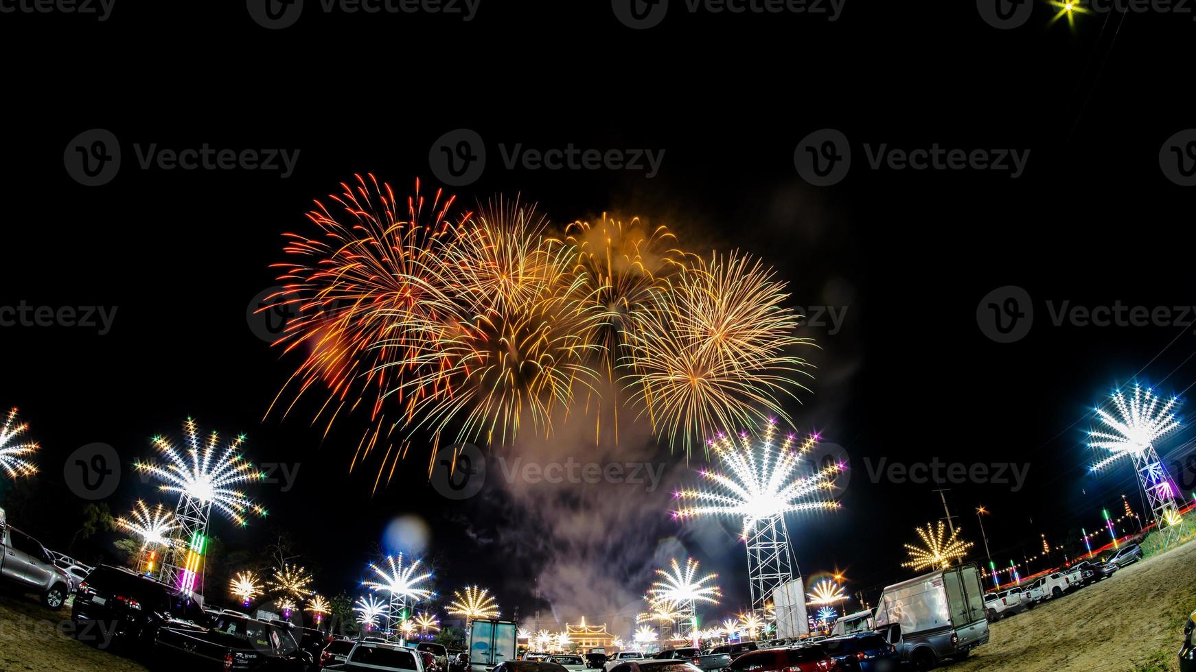 fireworks over the temple in the dark sky photo