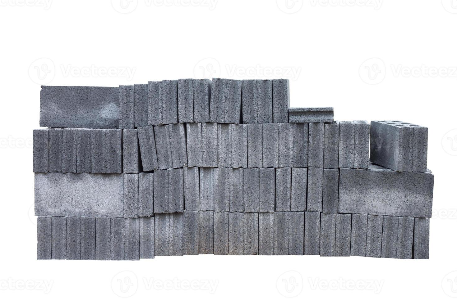 Stack of concrete blocks in construction site isolated on white background included clipping path. photo