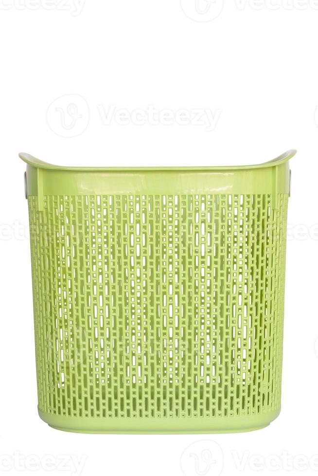 Green plastic basket isolated on white background. photo