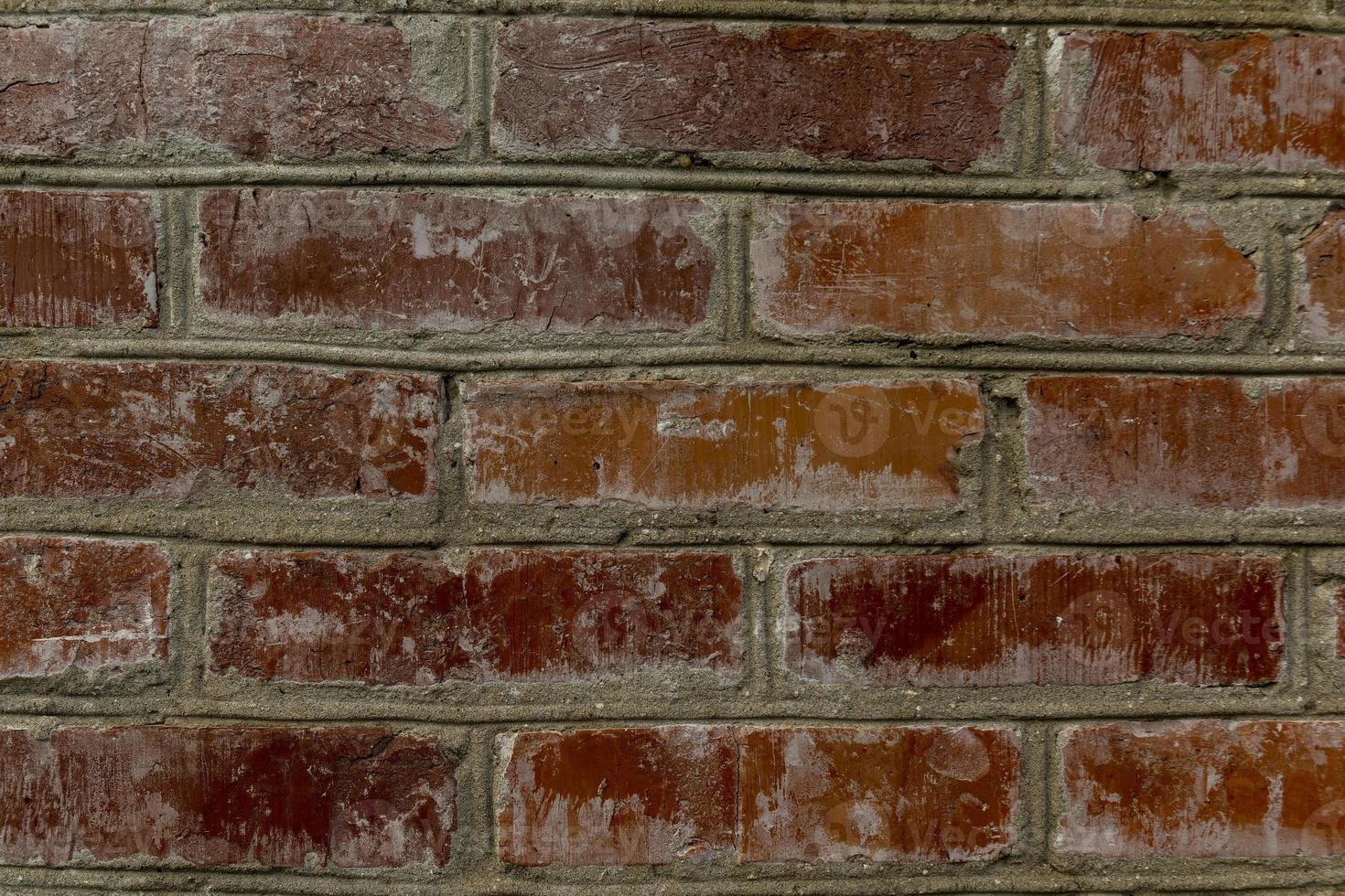 fondo de una antigua pared de ladrillo antiguo foto