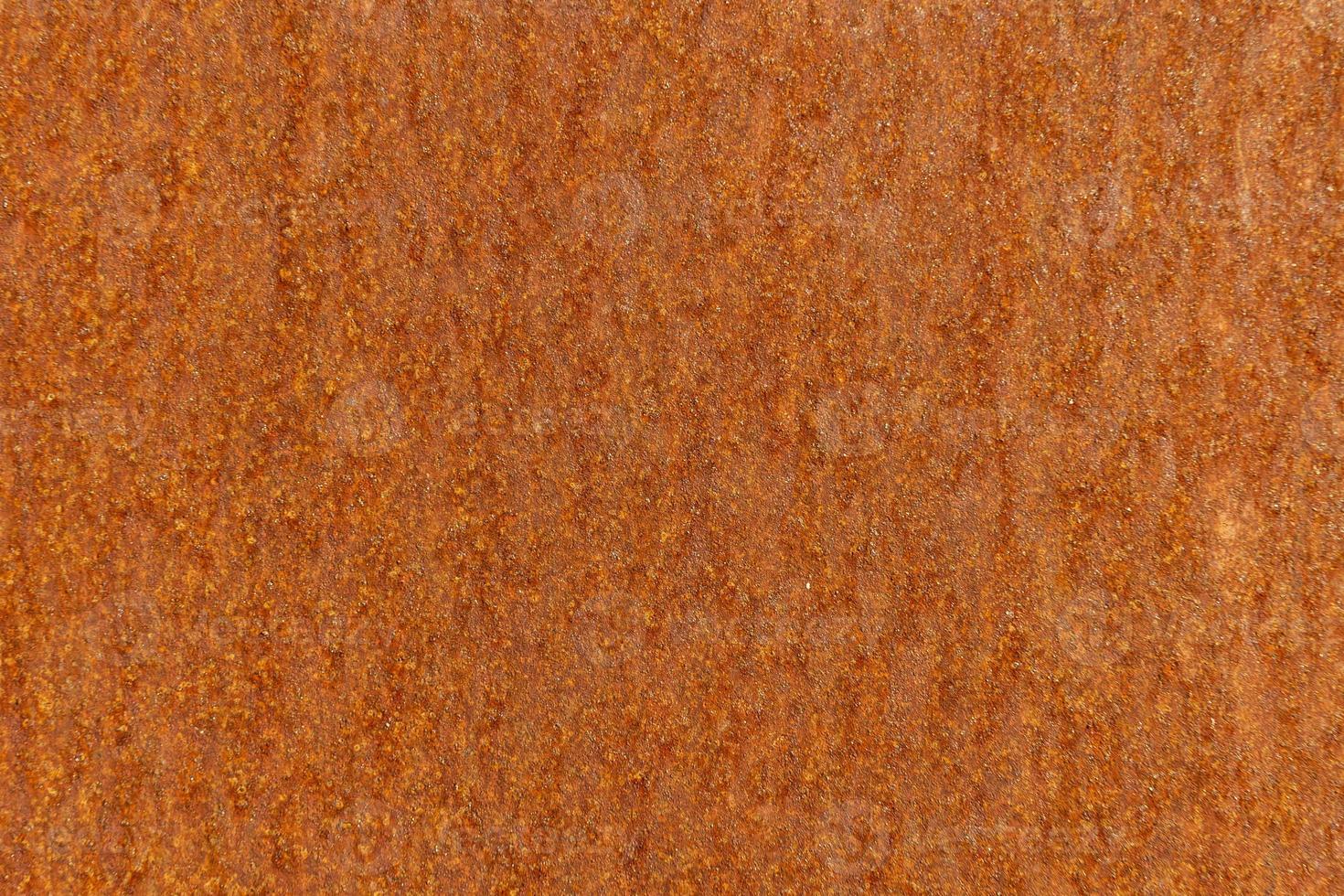 A close-up photo with the texture of a rusty metal surface. Background.