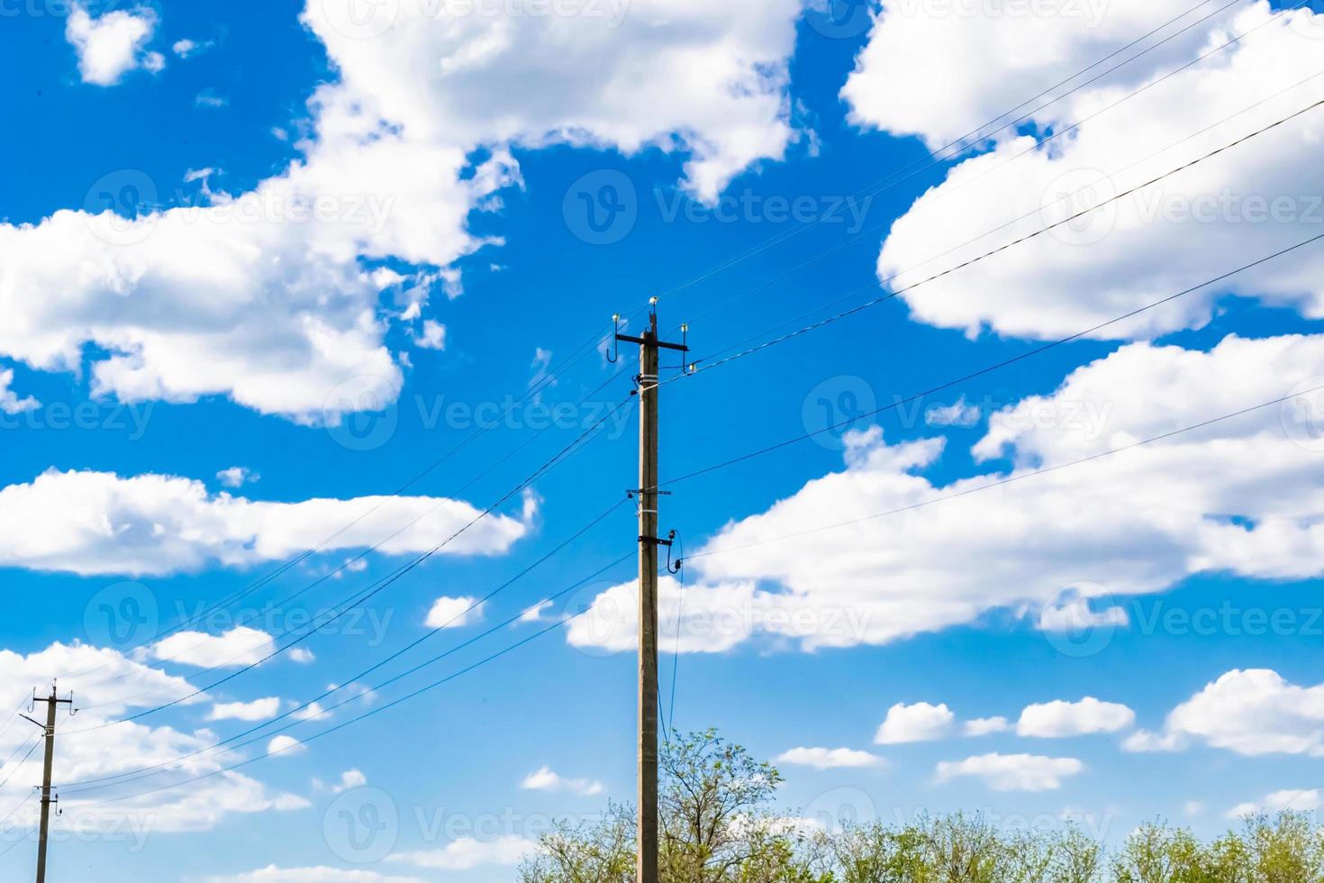 Power electric pole with line wire on colored background close up photo