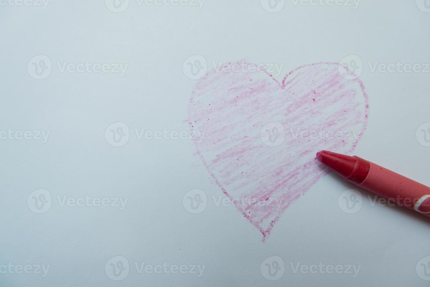 selective focus on the love symbol drawn by hand using colored pencils, soft focus photo