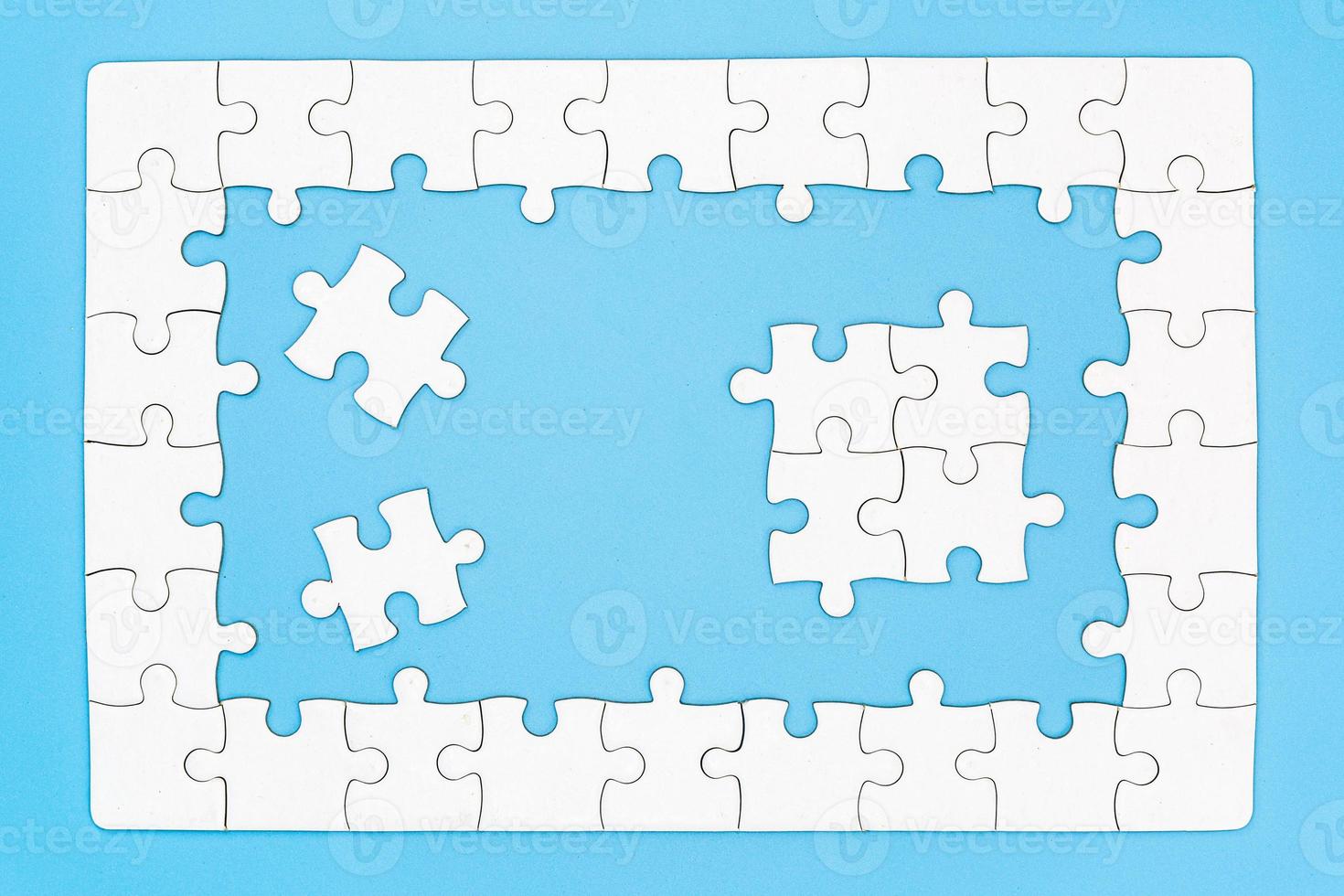 jigsaw puzzle pieces on blue background, Team business concept photo