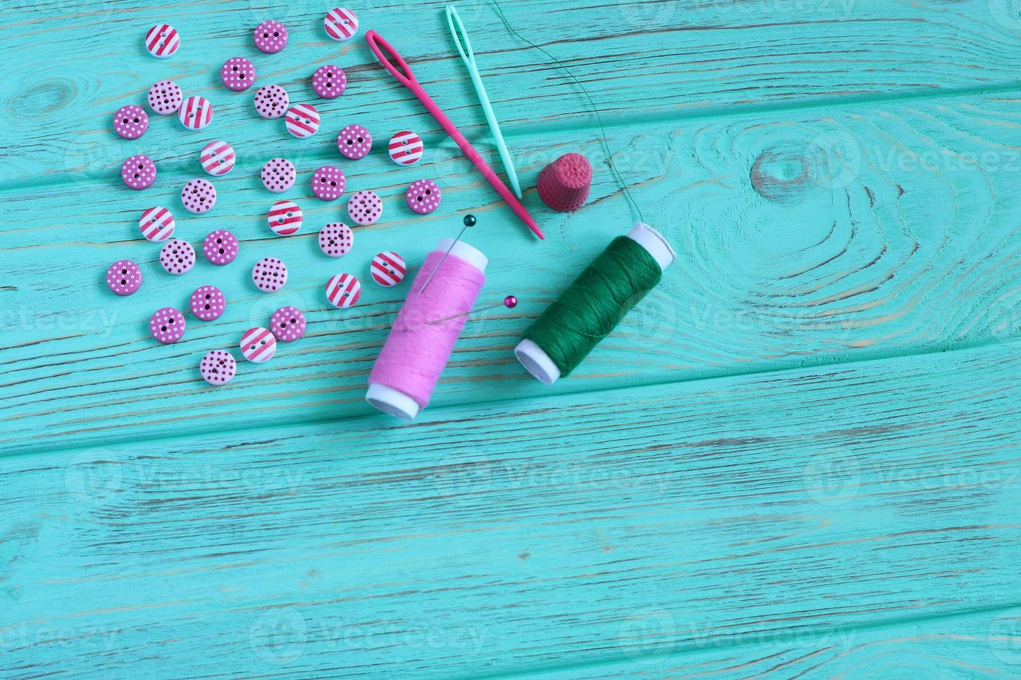 Sewing set on wooden table, copy space photo