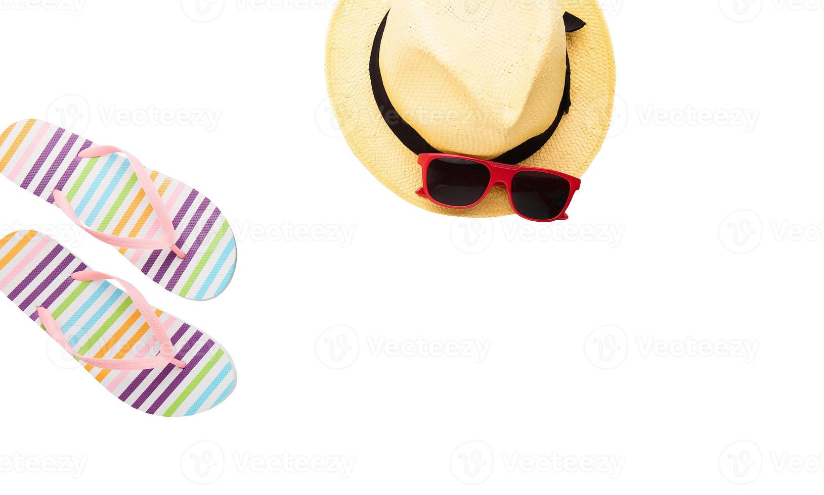 Summer accessories. Shoes, sunglasses, hat. Summertime background isolated on white. Flip flops top view. Striped slippers photo