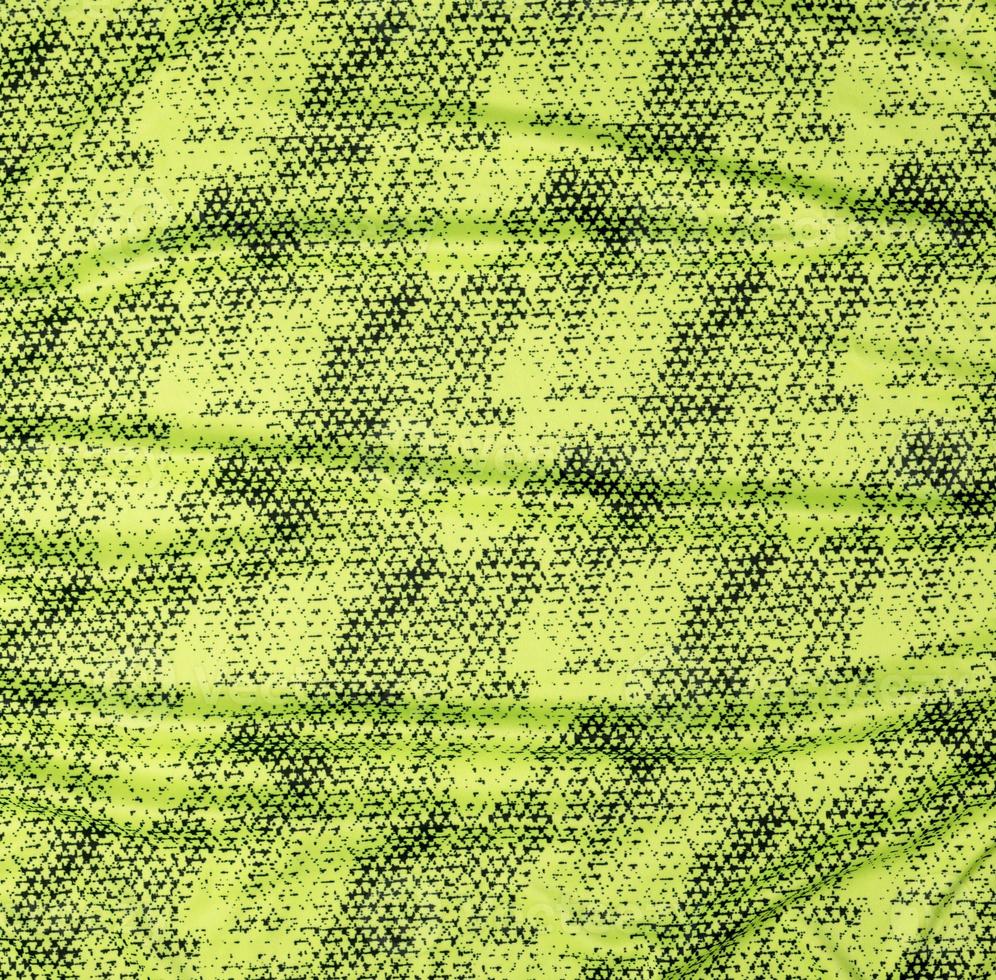 colored yellow-black synthetic fabric, full frame photo