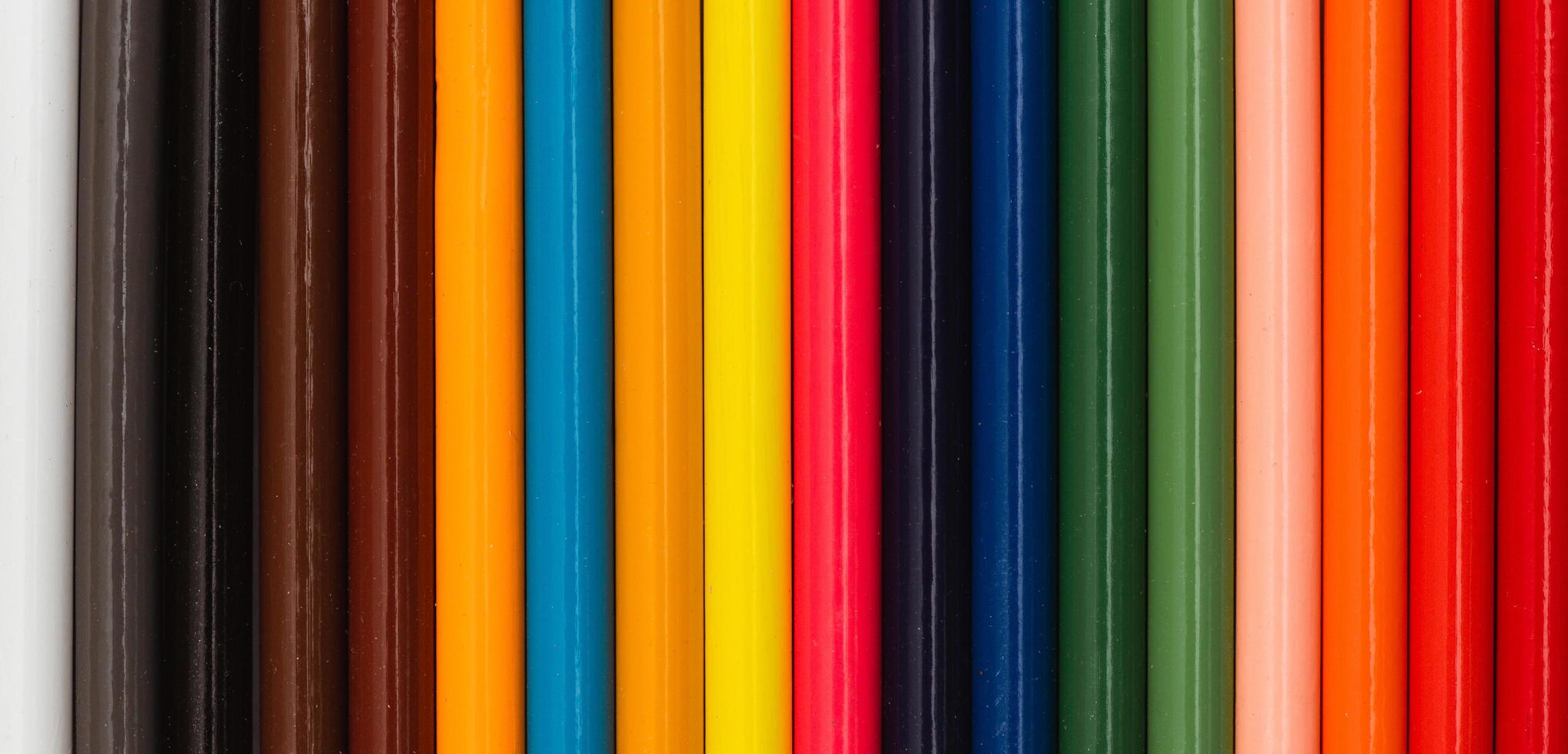 Multi color pencils. the concept of a multinational family and equality in the world. photo