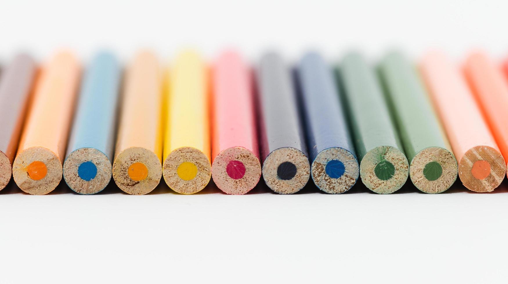 Multi color pencils. the concept of a multinational family and equality in the world. photo