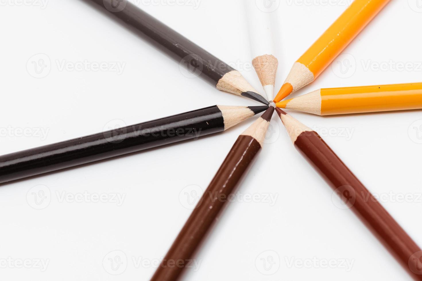 Multi color pencils. the concept of a multinational family and equality in the world. photo