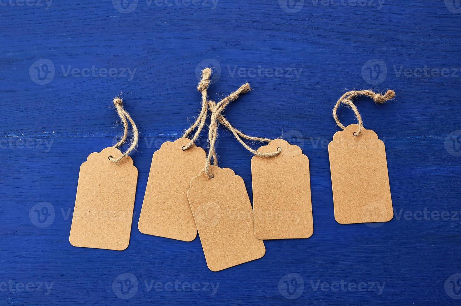 set of empty brown empty tags for clothes and other purposes photo