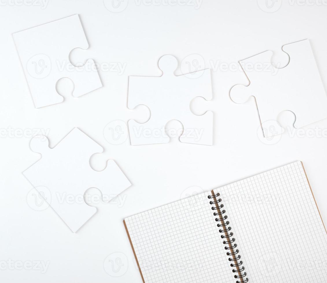 open notebook in a cell and on a white background photo