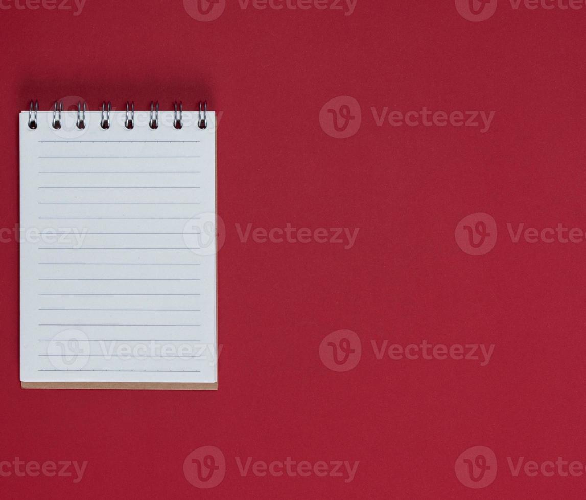 small notebook with empty white sheets in line photo