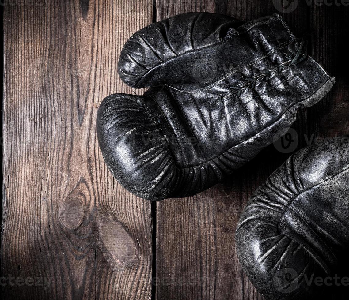 pair of old leather boxing gloves photo