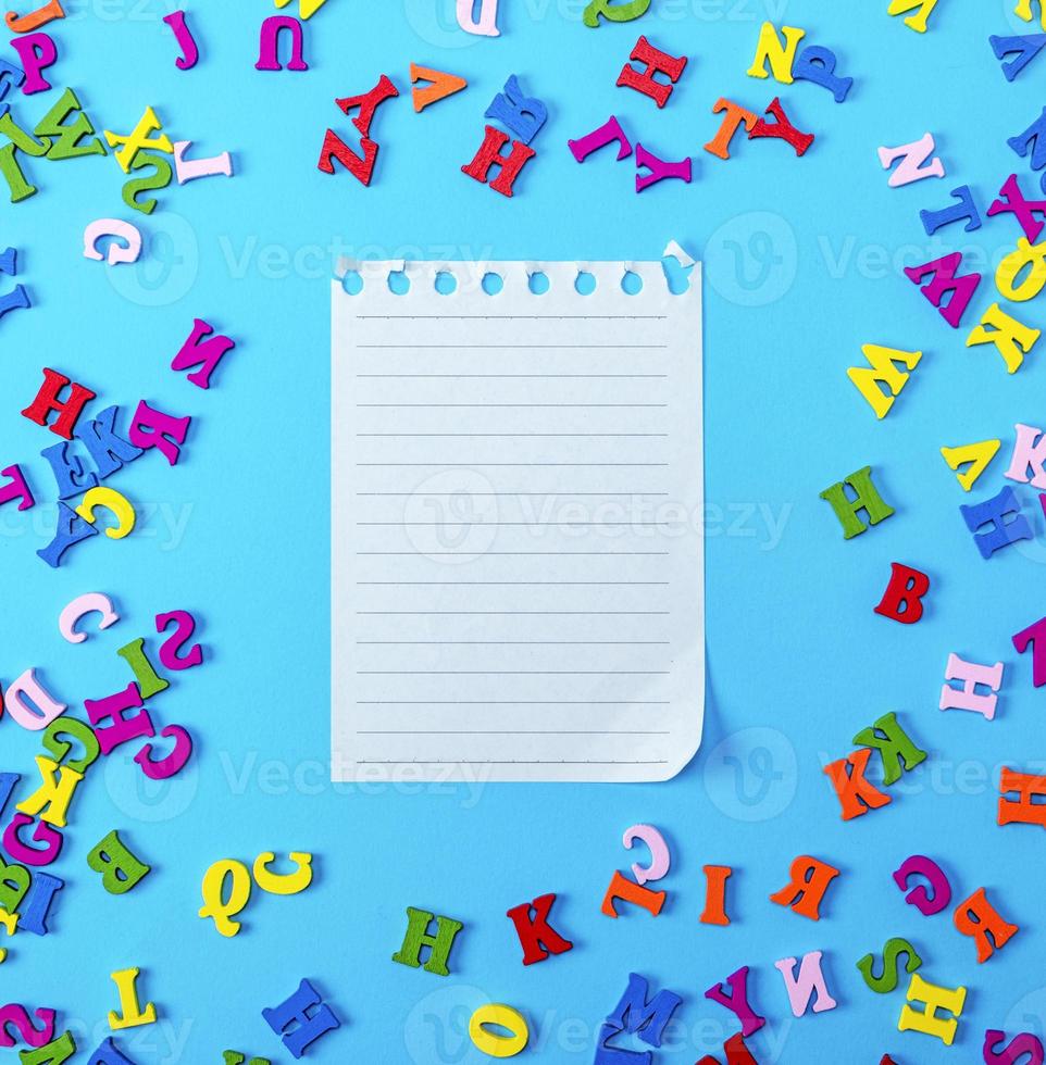 empty paper sheet in a line on a blue background photo