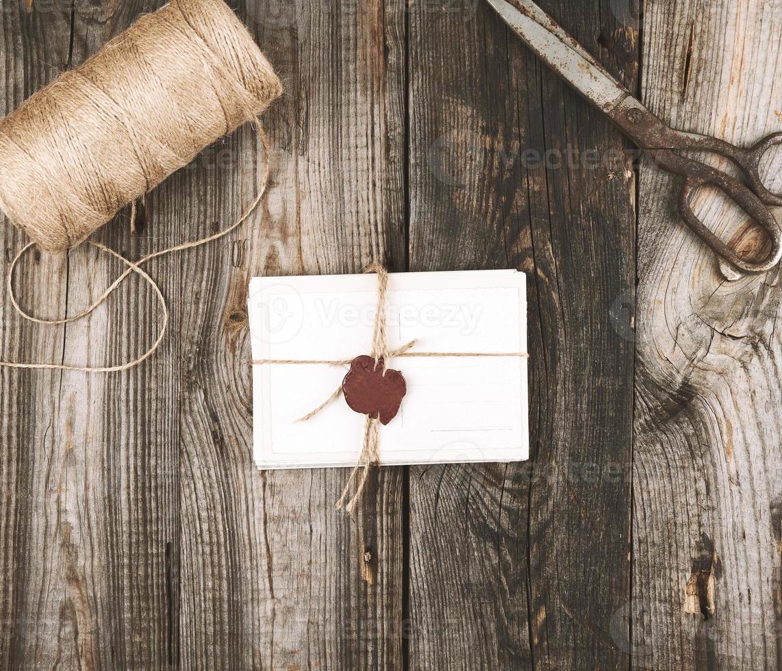 tied up with a rope a stack of empty cards photo