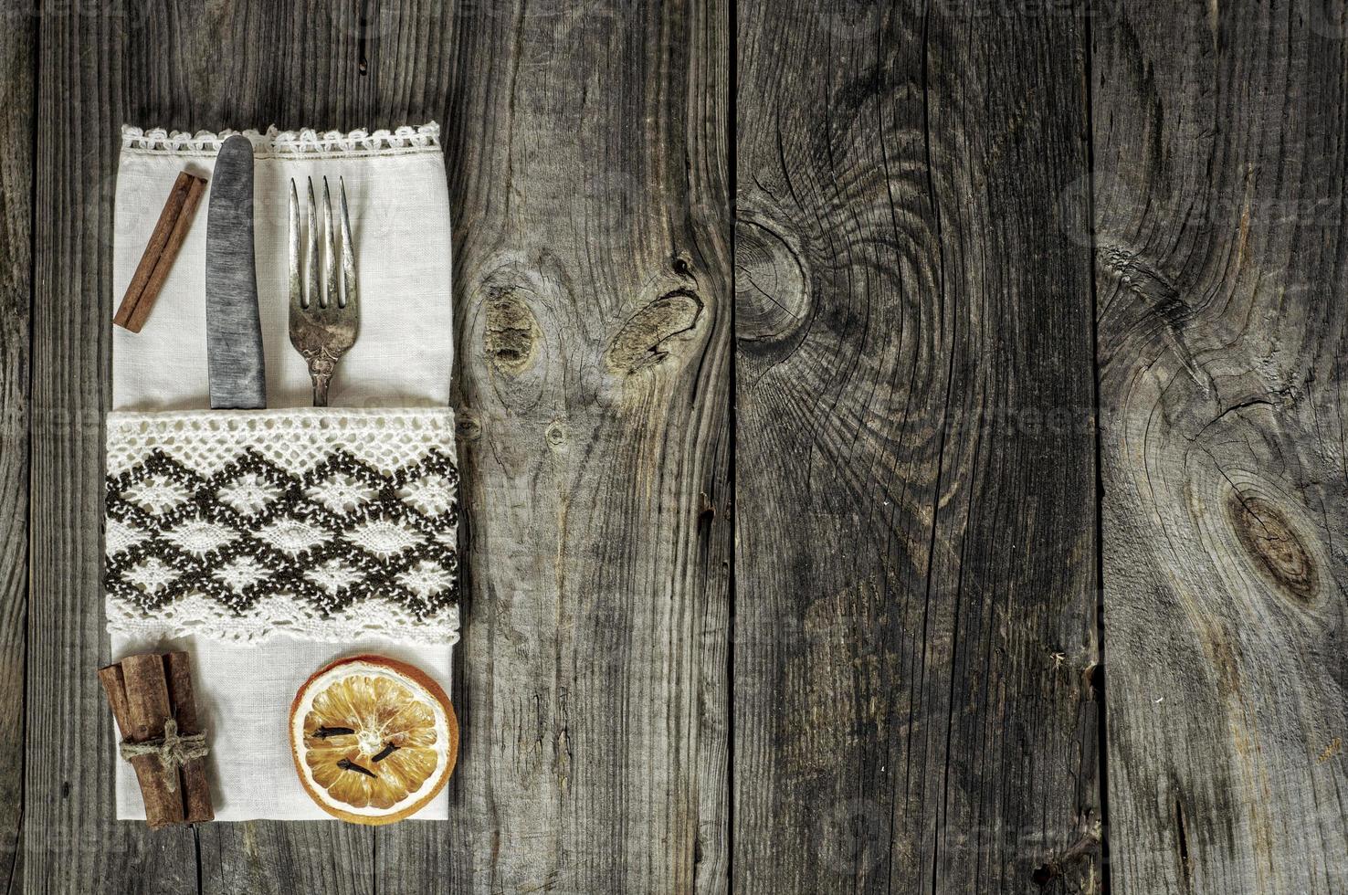 Metal utensils decorated with a napkin photo