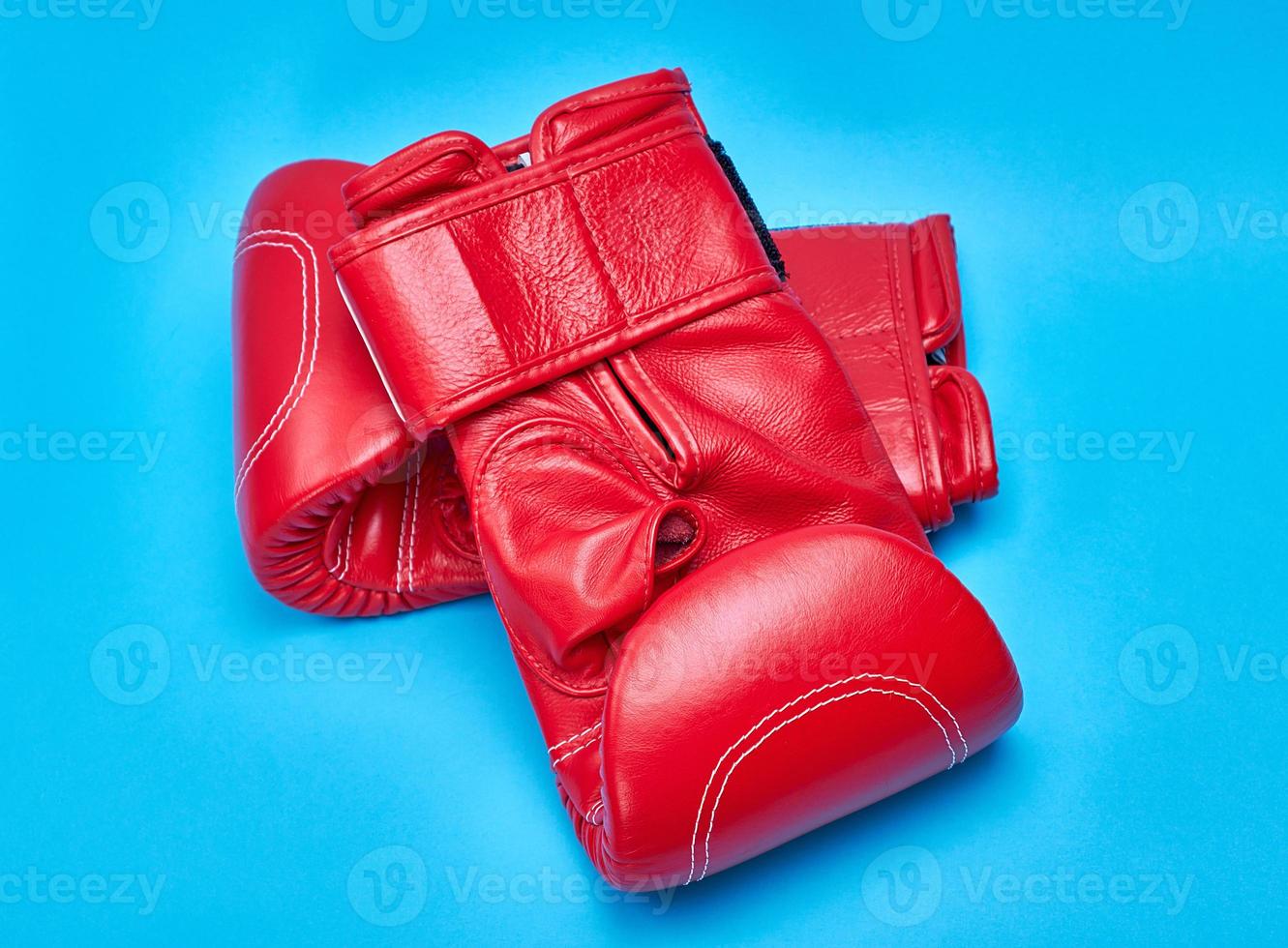 pair of red leather boxing gloves photo