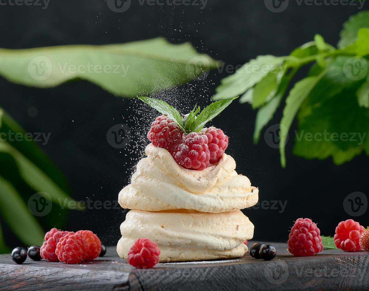 Baked cake made from whipped chicken protein and cream, decorated with fresh berries photo