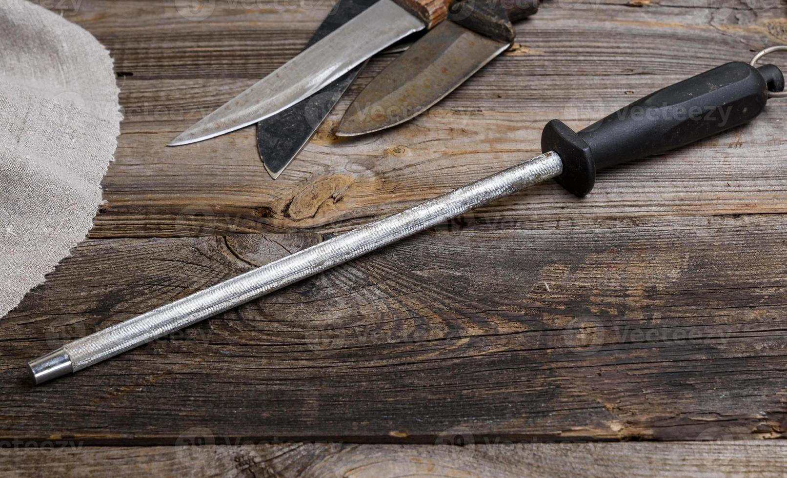 nife with sharpening on the table photo