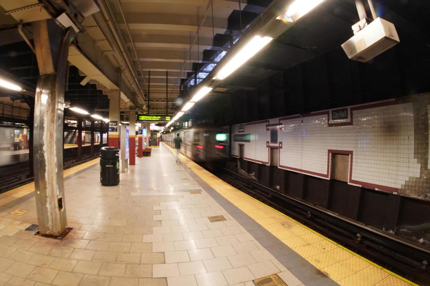 New york city subway moving train at 33 st station, 2022 photo