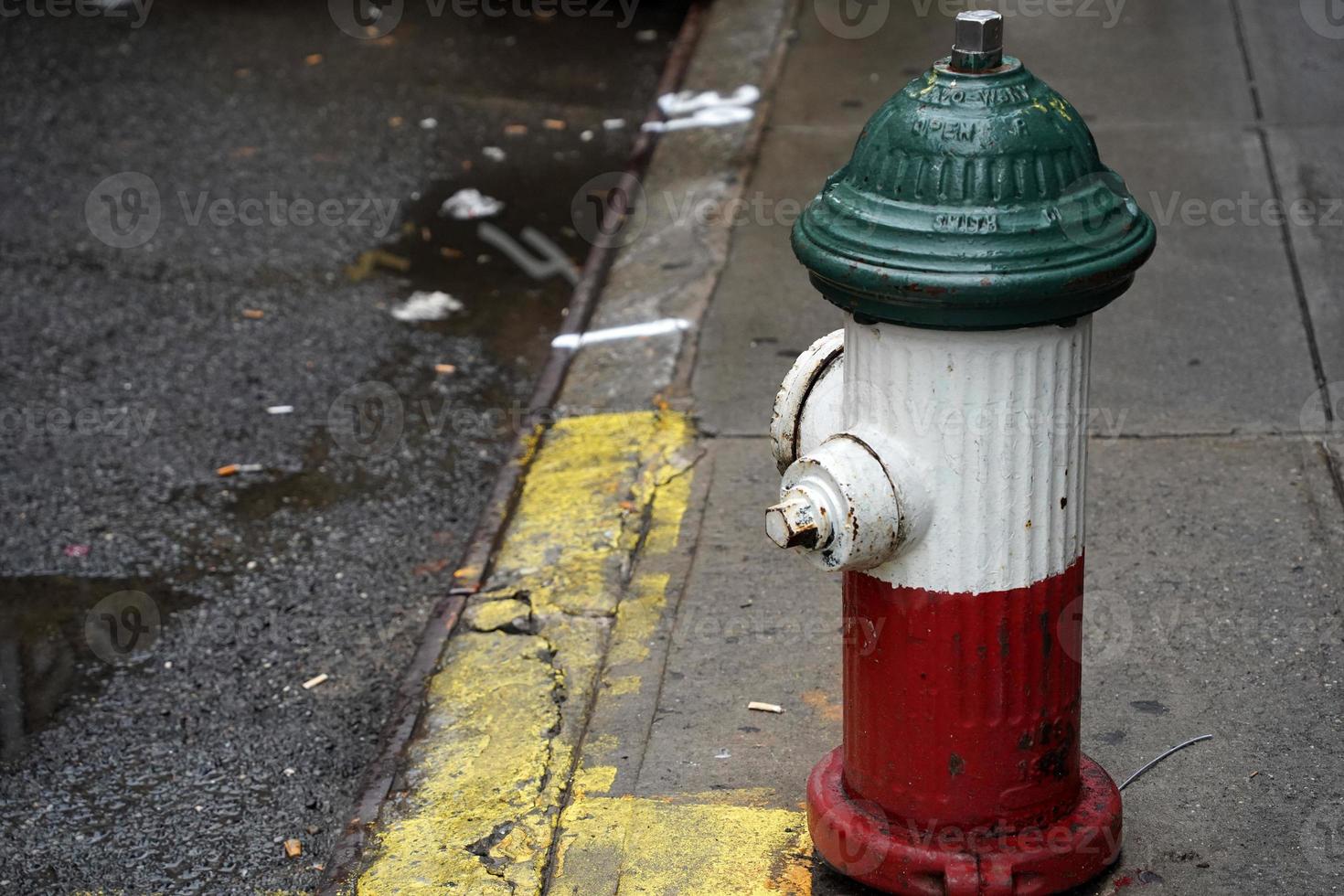 Little italy new york buildings italian flag green white and red hydrant photo