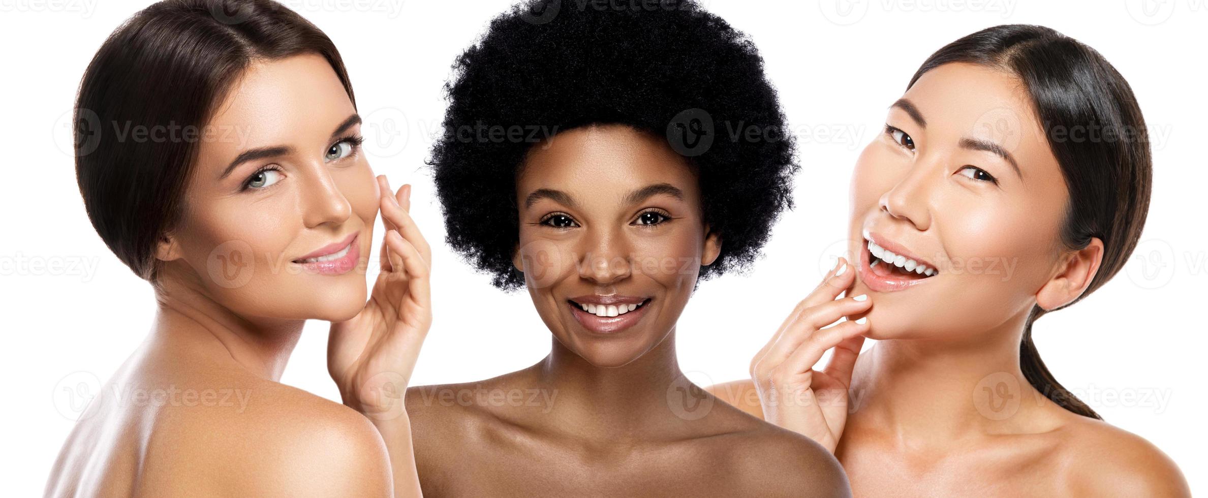 Different ethnicity women - Caucasian, African, Asian on white background photo