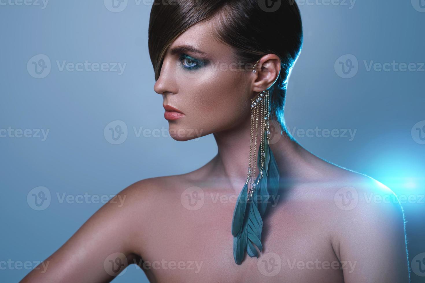 Model in stylish image with sleek hair covering one eye 19183329 Stock