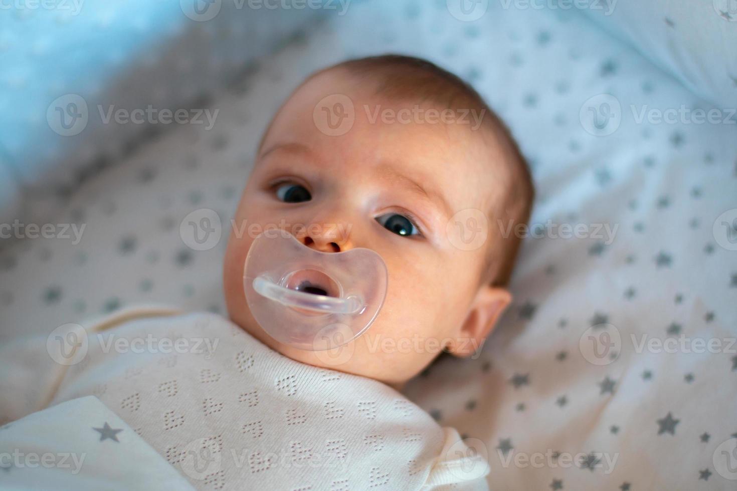closeup portrait of a beautiful little baby girl photo