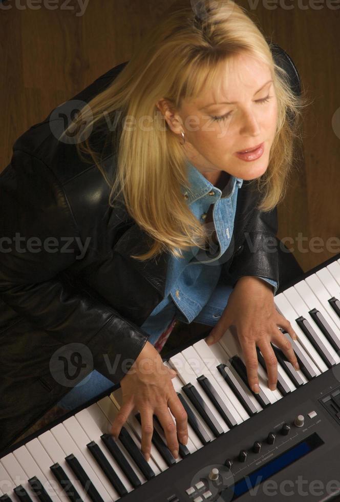 Female Musician Performs photo