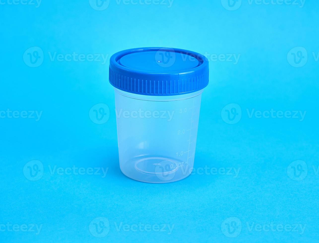 empty plastic jar for medical tests photo