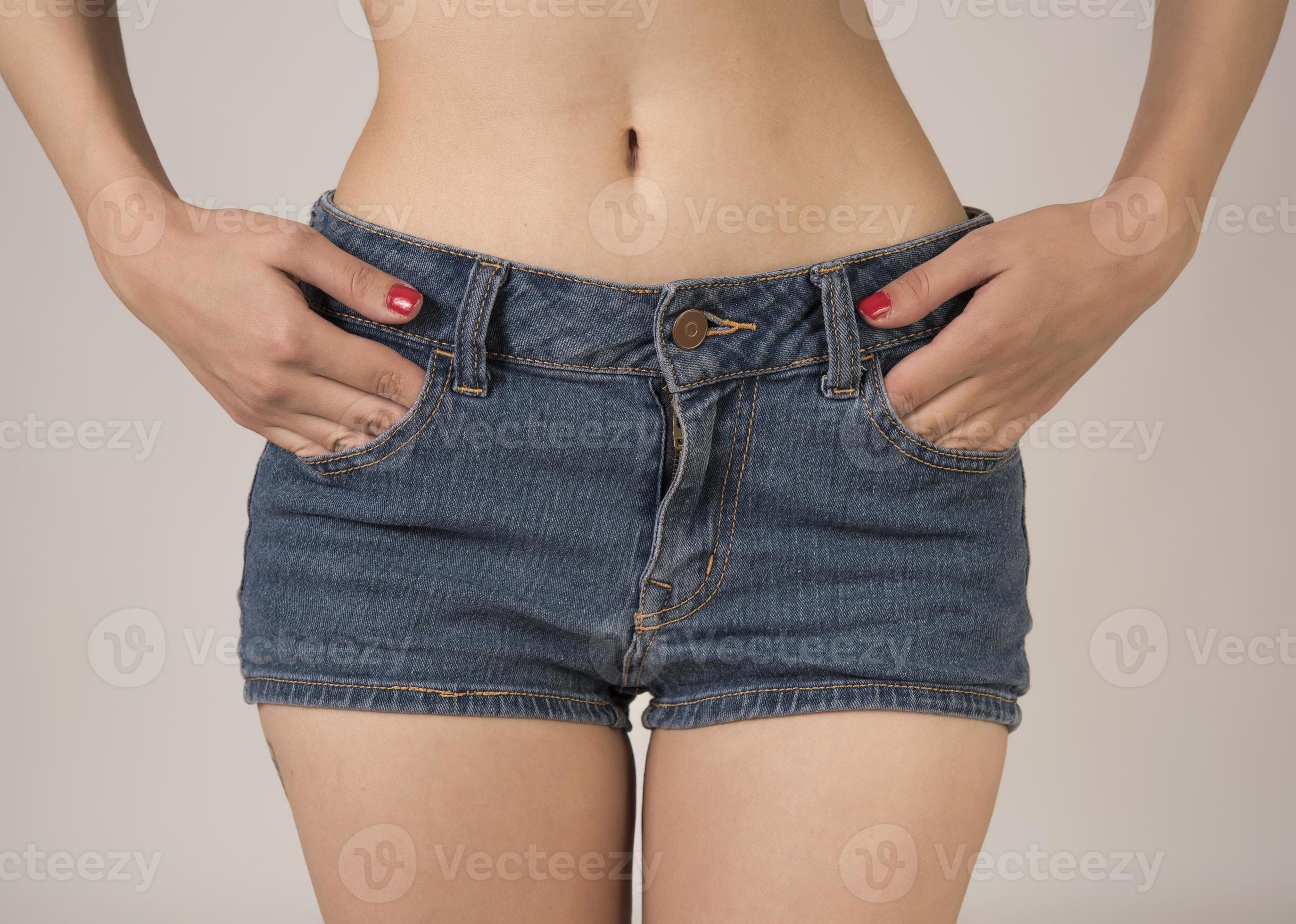 Sexy woman in fashion blue jeans shorts. Perfect hot booty and erotic curves  hips. Good body shapes whithout cellulite. Sport and diet. 19199566 Stock  Photo at Vecteezy