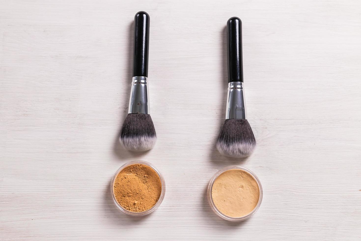 Mineral face powder and brush. Eco-friendly and organic beauty products photo