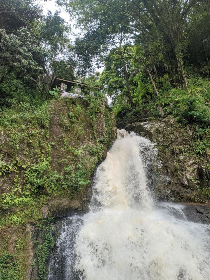 mountain stream or waterfall in Berastagi forest photo