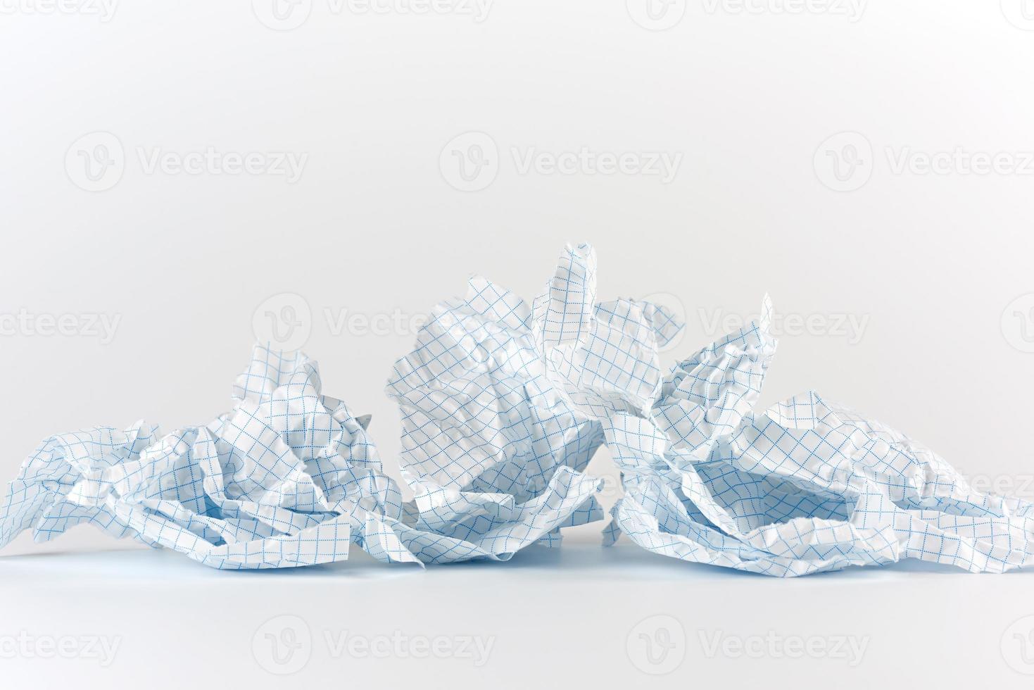 empty torn pieces of paper from notebook to cell photo