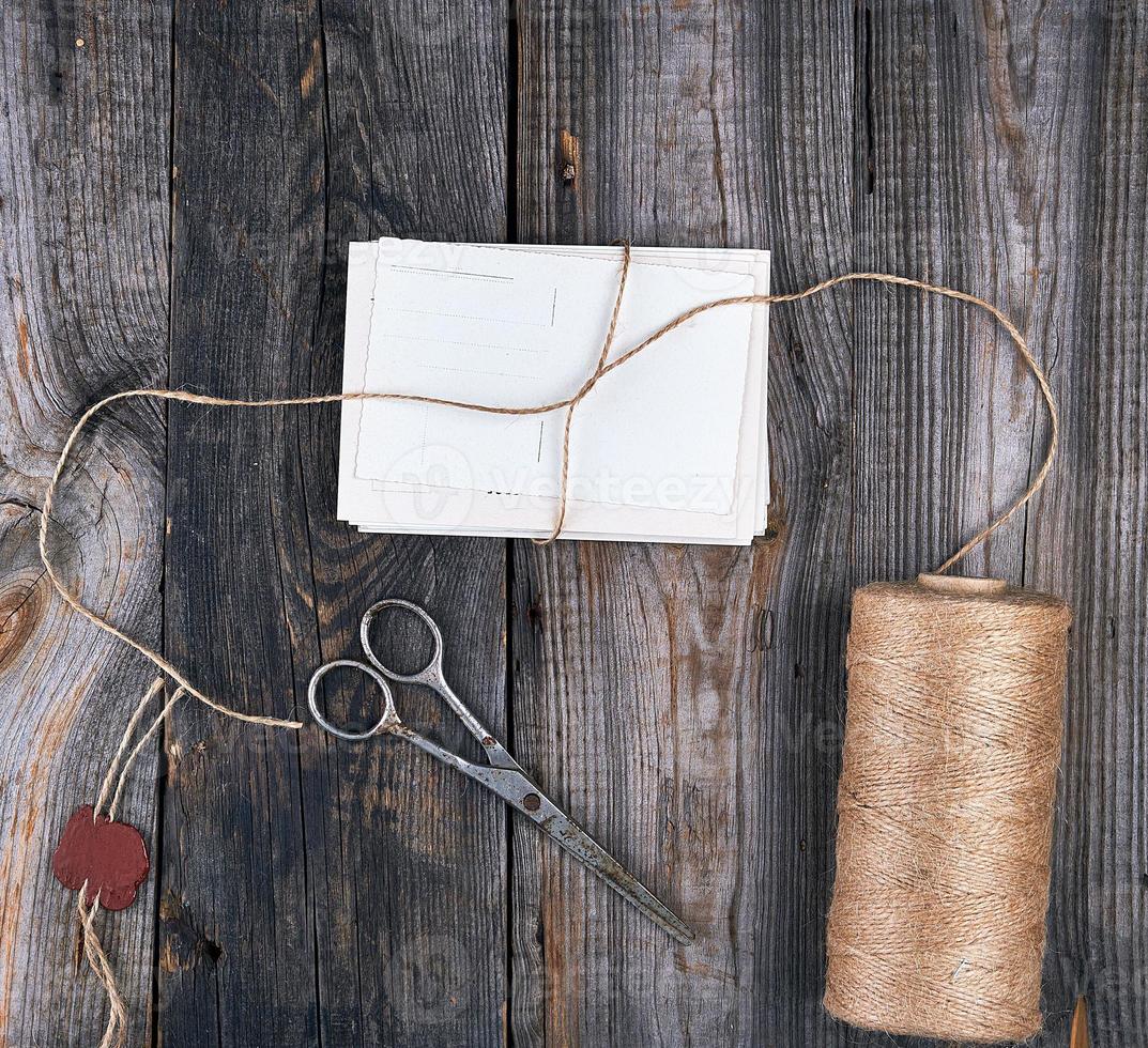 tied up with a rope a stack of empty cards photo