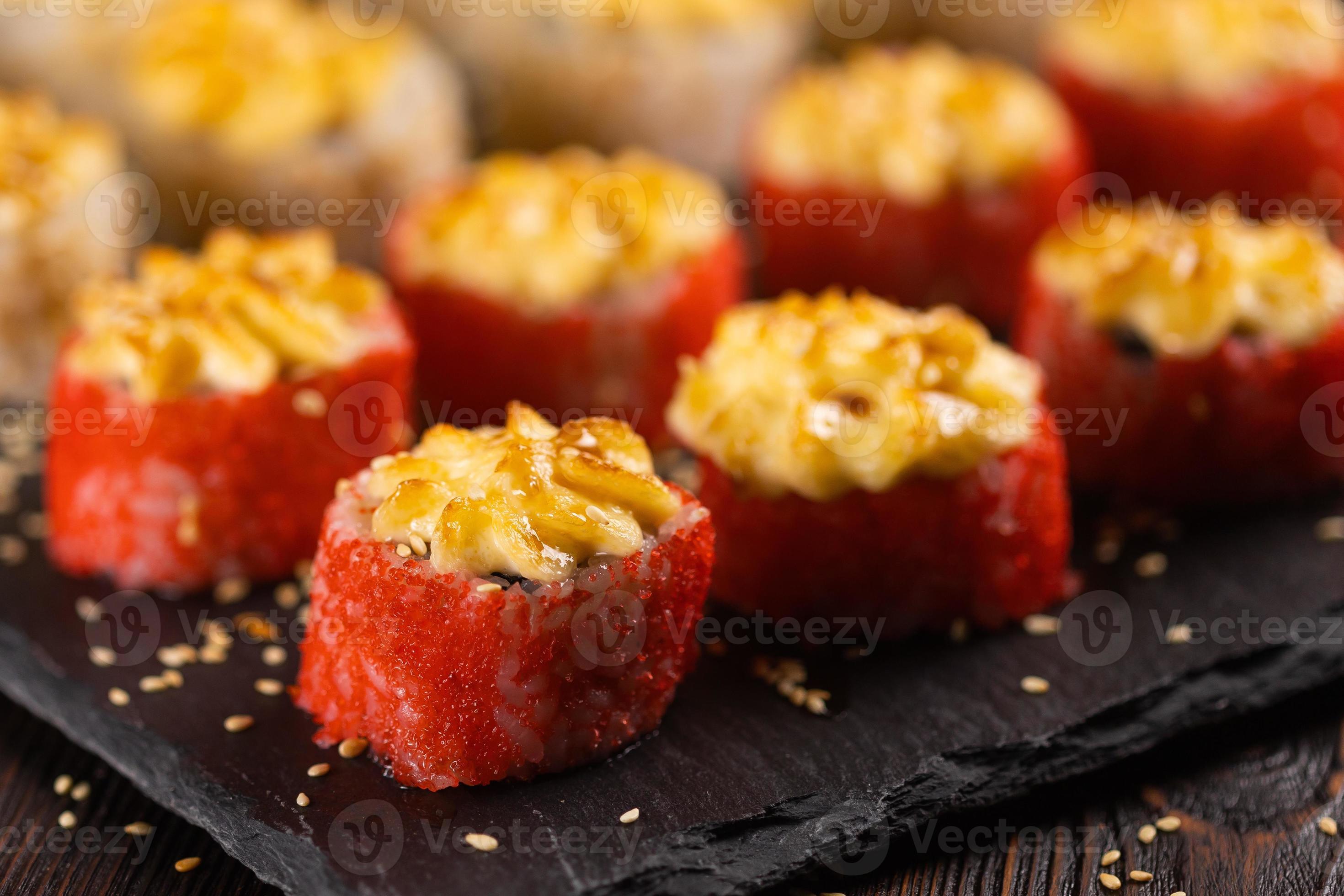 Japanese salmon sushi with spicy mayonnaise and tobiko caviar Sushi
