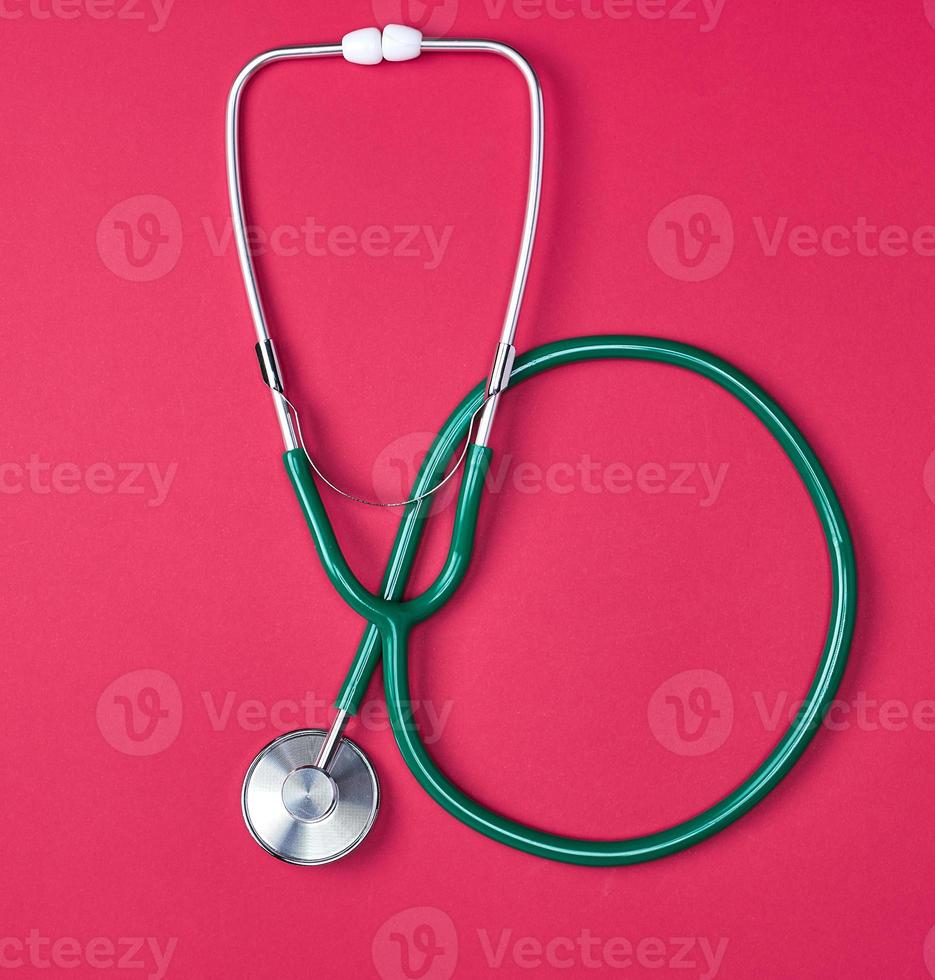 green medical stethoscope photo